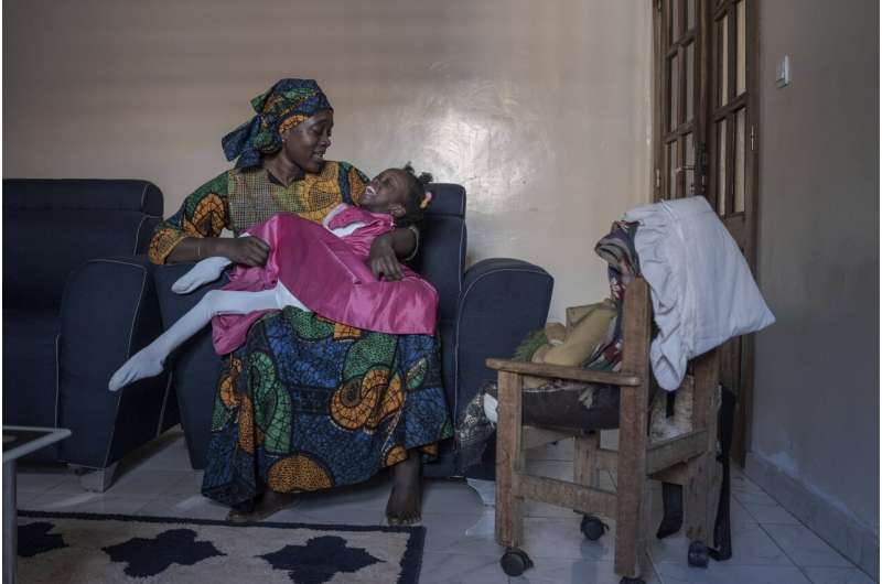 Fatoumata Sané holds her daughter Aissata, 8, who suffers from a rare genetic disease, at their home in Dakar, Senegal, Saturday, Jan. 11, 2025. Credit: AP Photo/Annika Hammerschlag Rare diseases often go undiagnosed or untreated in parts of Africa. A project seeks to change that